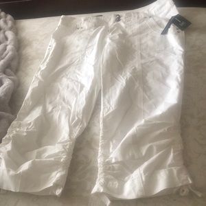 INC Regular Fit A sleek fit tailored through the Hip and Thigh